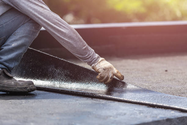 Professional Basement Waterproofing technician working in Milltown, NJ